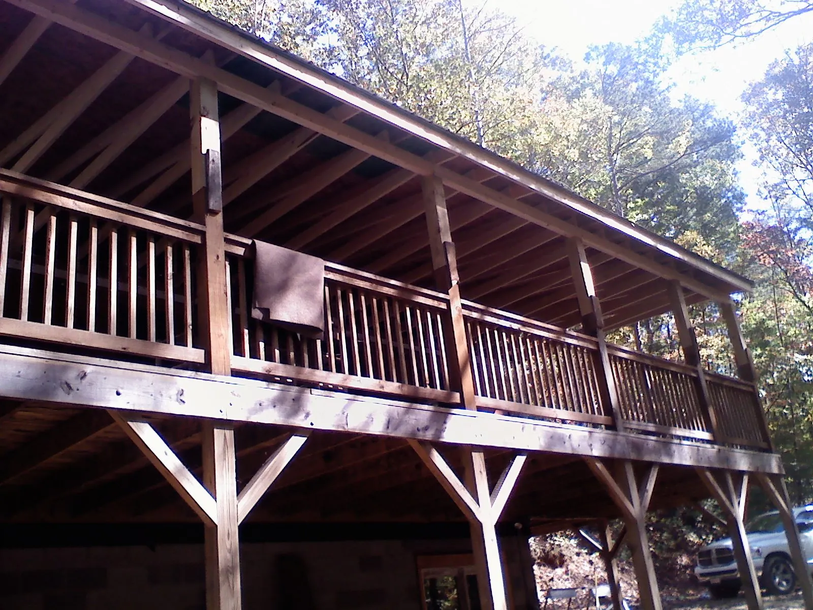 Timber framing under a new elevated porch and deck — Roof Leak Repair in Massena by Roofing Brothers